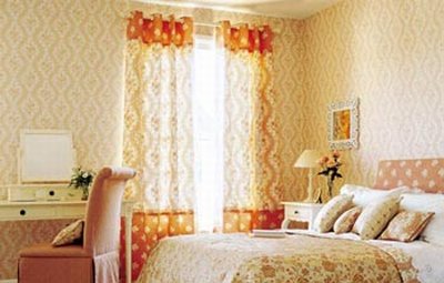 精致的暖橙色布艺 展现温馨的卧室空间(组图)