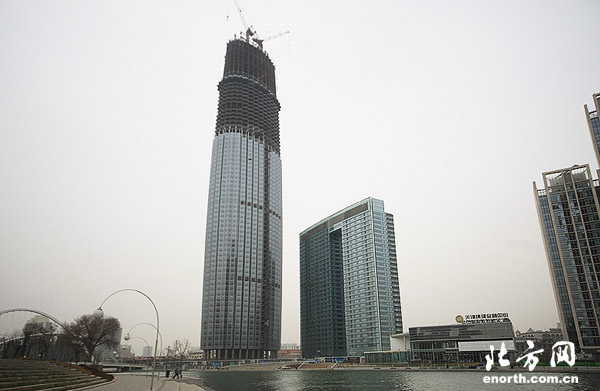 作为天津新的地标建筑,津门津塔的建设一直备受关注.